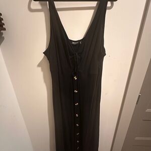 Black sleeveless midi dress with button detailing (buttons are decorative only)